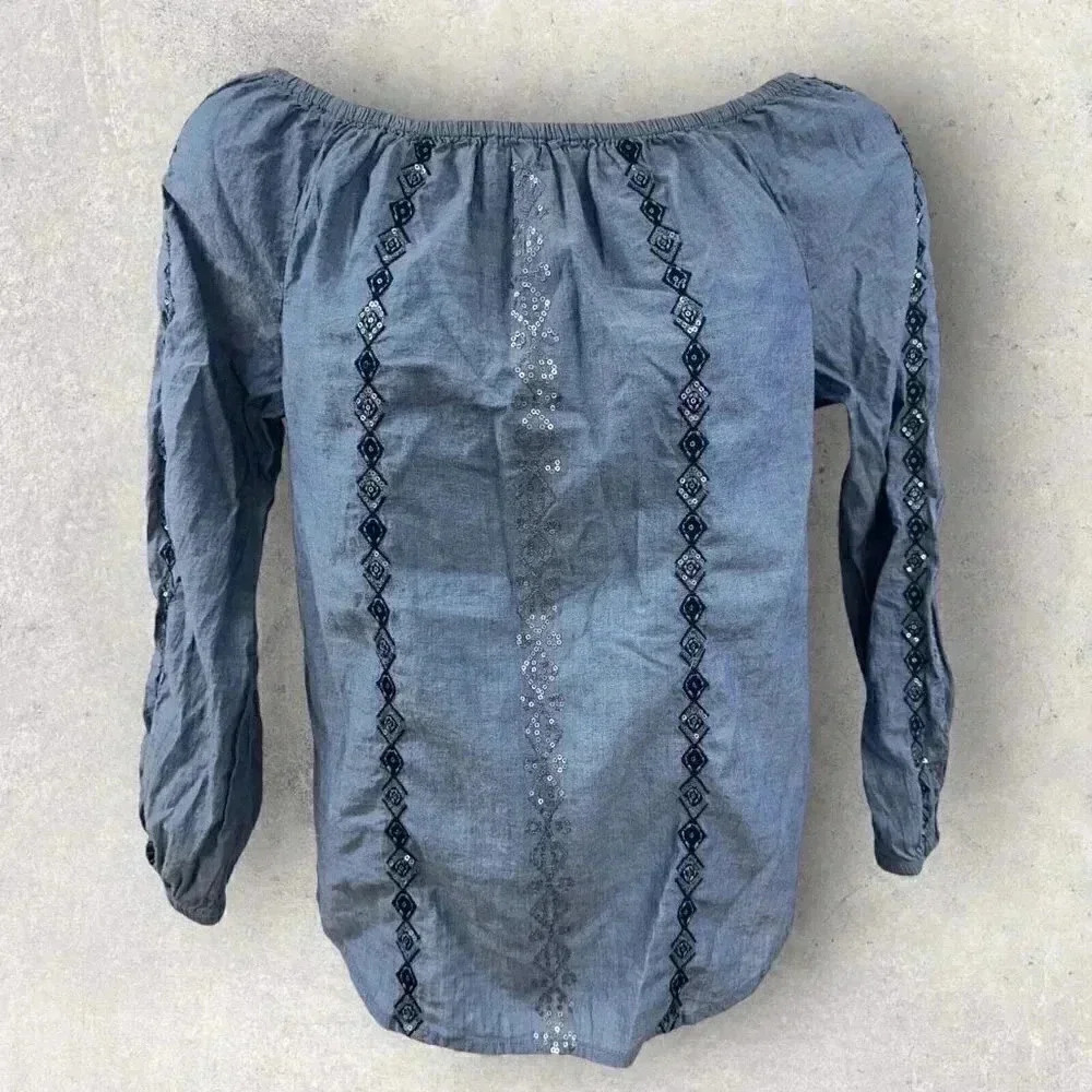 Denim colored Chico’s Women’s shirt with sequins, size 1 USM/8